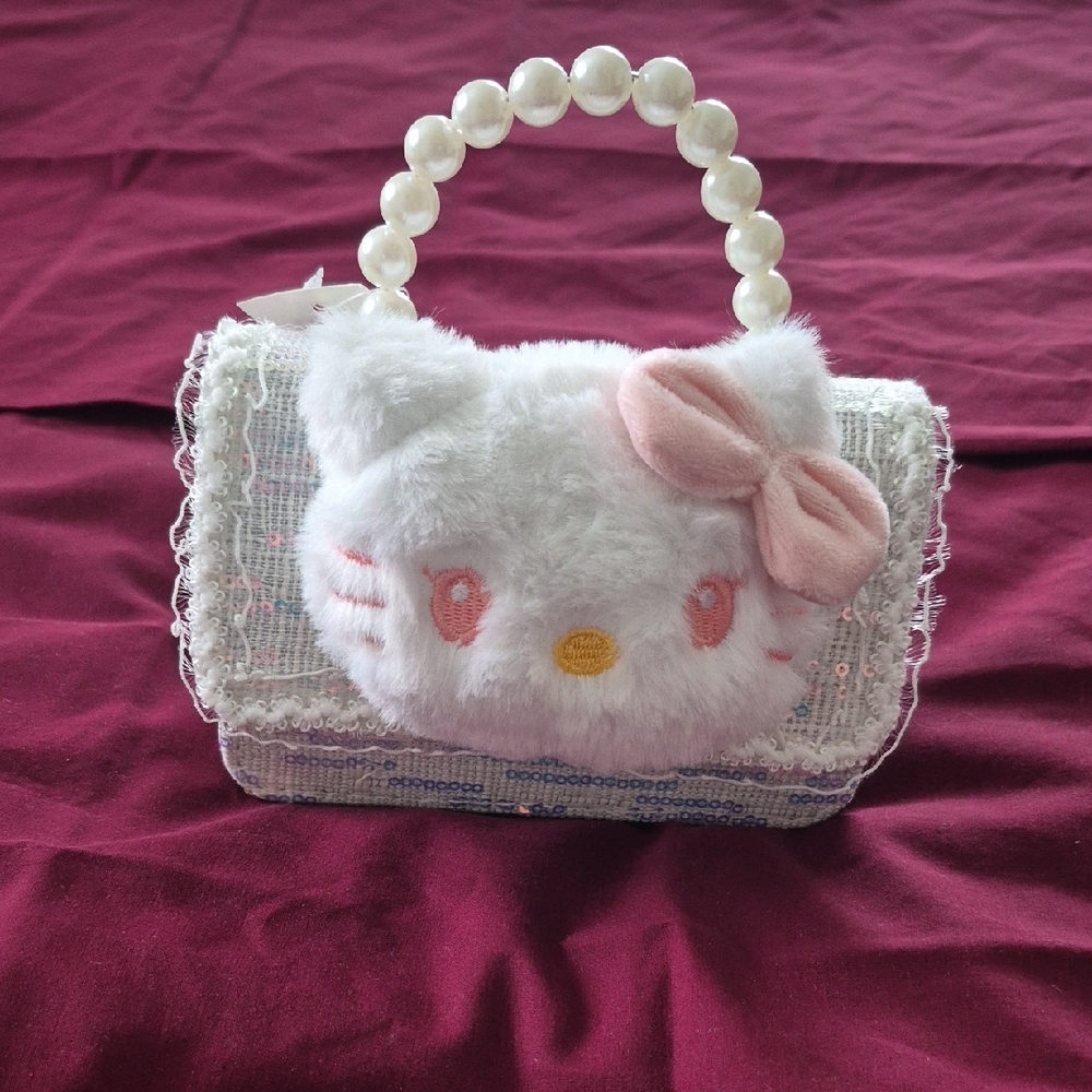 Hello Kitty White and Pink Clutch Rare. Very Firm On Price